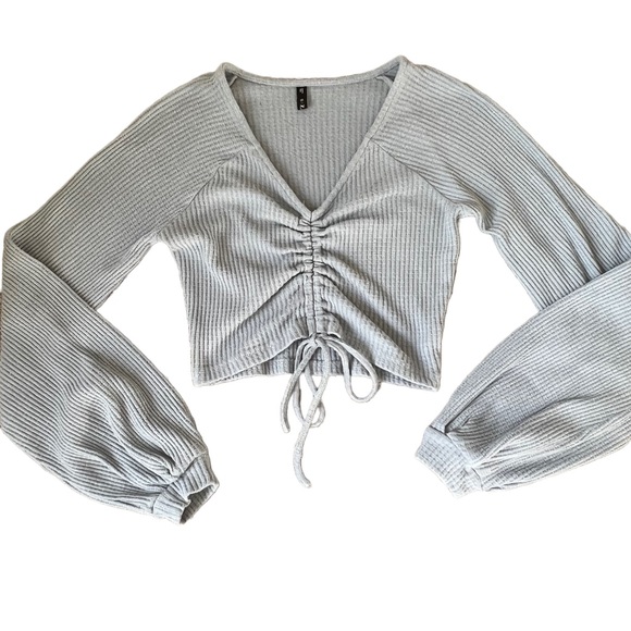 ZAFUL LIGHT BLUE WAFFLE KNIT LONG SLEEVE CROP TOP WITH TIE AND PUFF SLEEVES - Picture 2 of 8